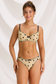 Front view of the pale yellow mesh lingerie set with black roses, dot print and contrasting trim