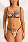 Black and pink bow bra and panty set without the garter belt, showing sheer mesh and adjustable thong hip straps