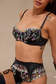 Black floral embroidered lingerie set with pastel detailing