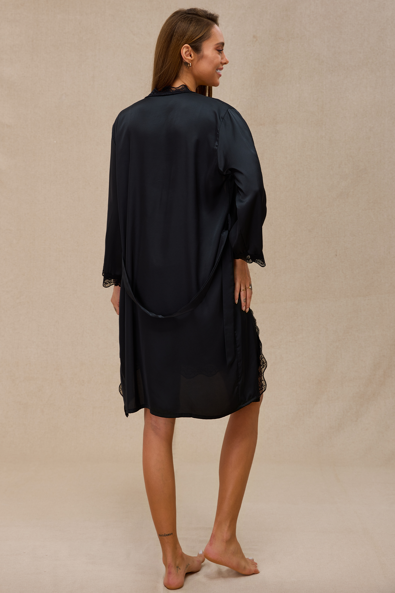 Black satin robe with wide sleeves and belt