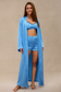 Full-length satin robe worn over blue loungewear set