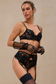 Romantic black garter belt with floral embroidery