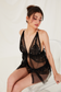 black pearl lingerieclose-up of black pearl-embellished babydoll lingerie set

